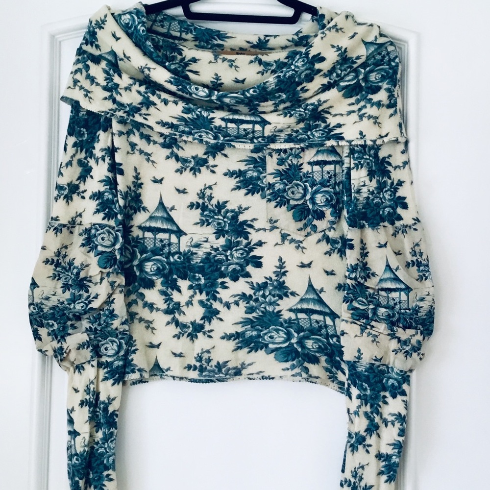 Galliano sweater w/over-sized draped collar.